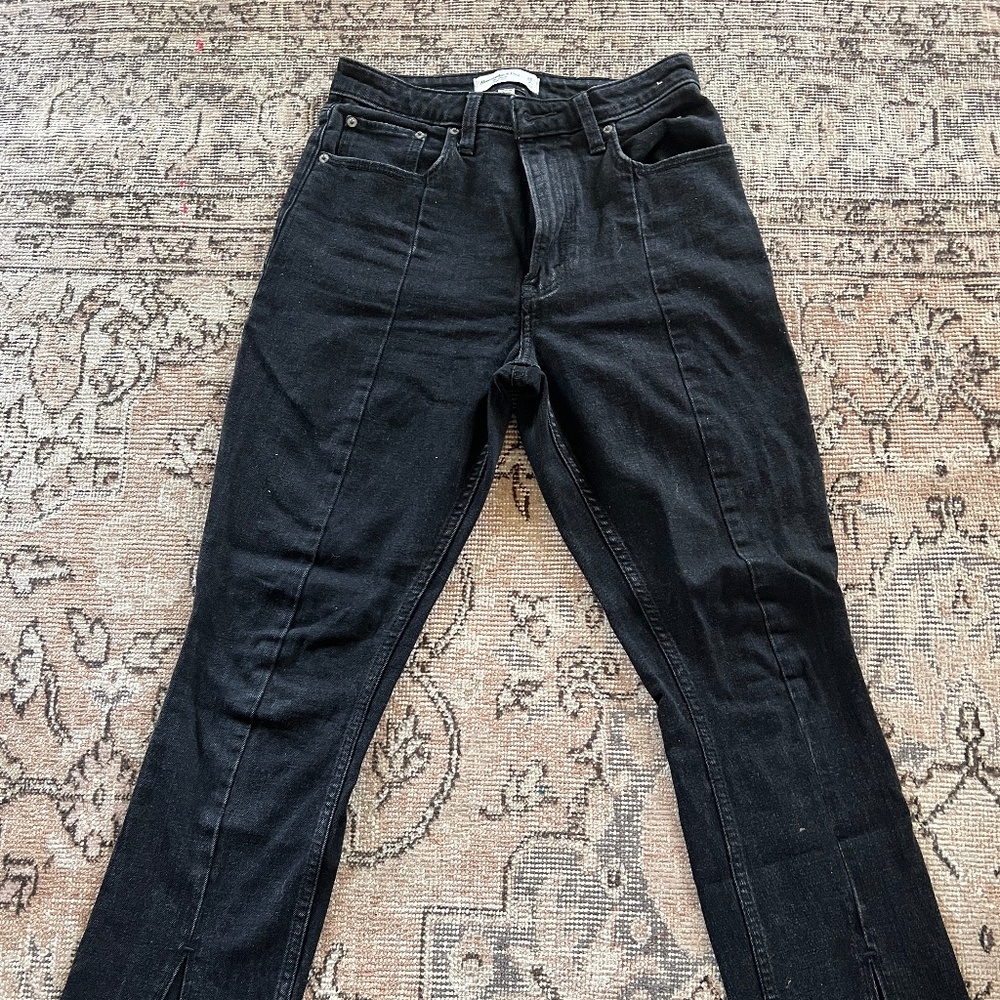 Black jeans slit bottom